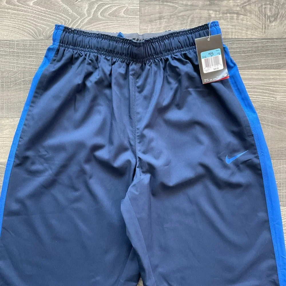 NWT Nike Team Woven Dri Fit Training Pants Men’s MEDIUM Blue Cord Hem 377786-451